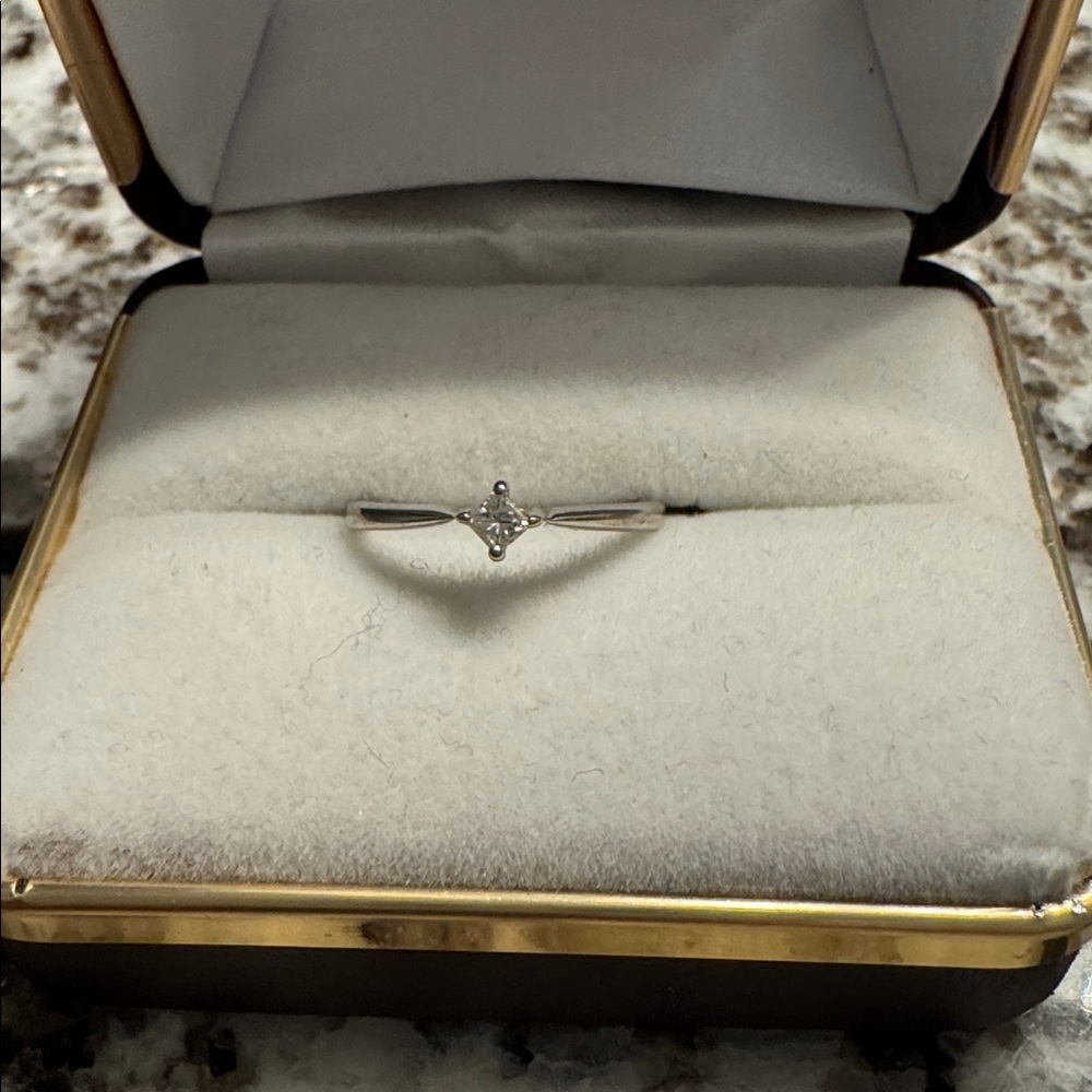 Elegant Ring with Diamond Accent.